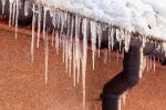 Icicles/Ice Dams on the edge of the roof